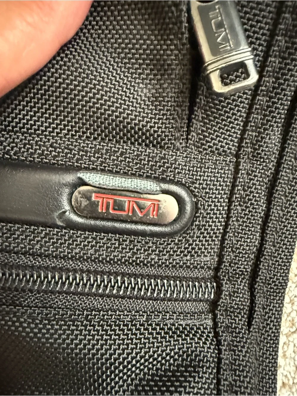 Tumi Bifold Black Travel Garment Bag with Multiple Front Pockets